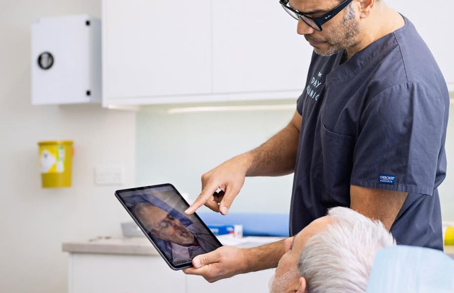 Consultant surgeon Dr Abood discussing treatment options with a Cambridge patient.